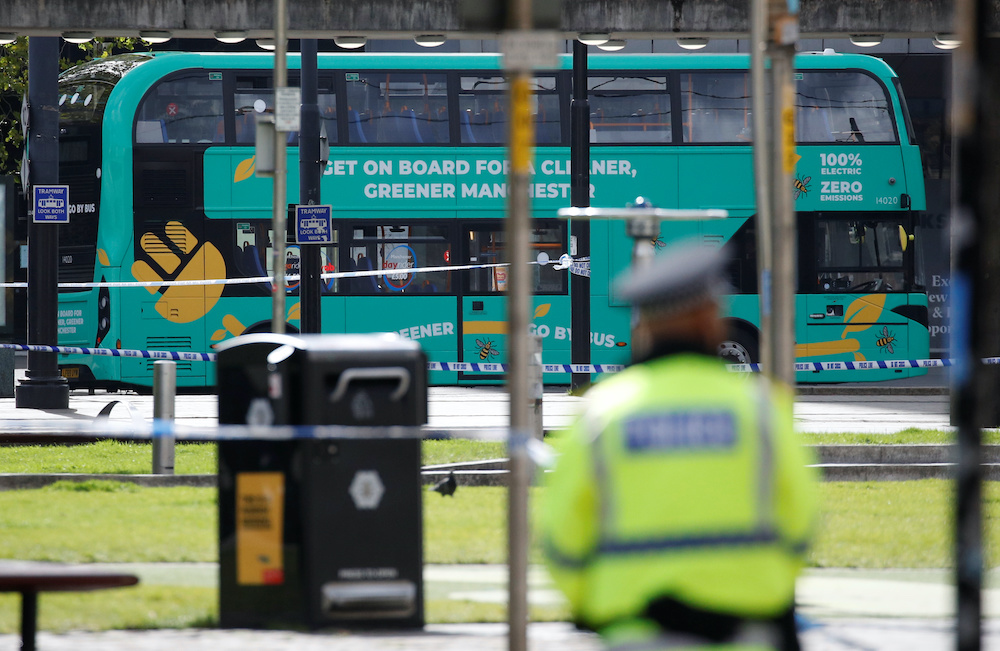 A bus is seen inside the security cordon after a suspect package was found, in Manchester city centre, Britain September 5, 2020. u00e2u20acu201d Reuters picn nn