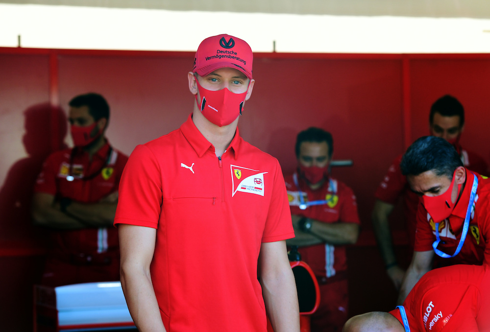 File photo of Mick Schumacher posing by Ferrari engineers and staff before the race at the Tuscan Grand Prix in Mugello, Scarperia e San Piero, September 13, 2020. u00e2u20acu201d Reuters picnnn