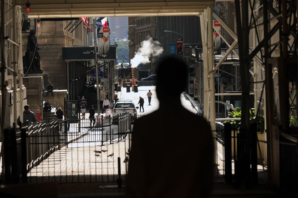 People walk in front of the New York Stock Exchange (NYSE) in lower Manhattan on September 21, 2020 in New York City. u00e2u20acu201d AFP pic
