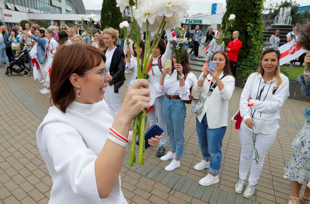 Representative of the Coordination Council for members of the Belarusian opposition Olga Kovalkova holds flowers as she attends an opposition demonstration to protest against presidential election results in Minsk, Belarus August 22, 2020. u00e2u20acu201d Reuters pic