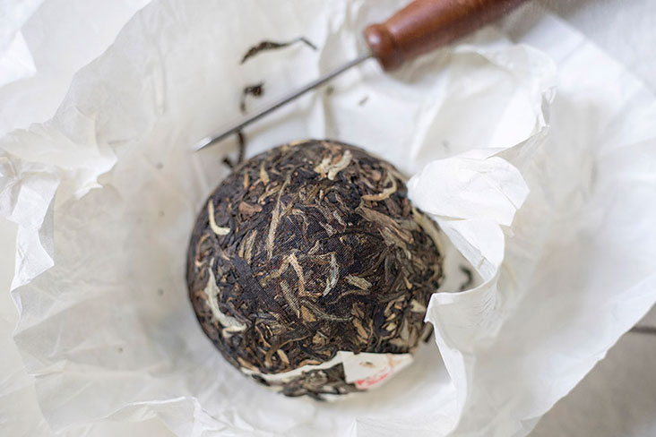 Aged raw 'pu’er' comes in the form of compressed tea cakes