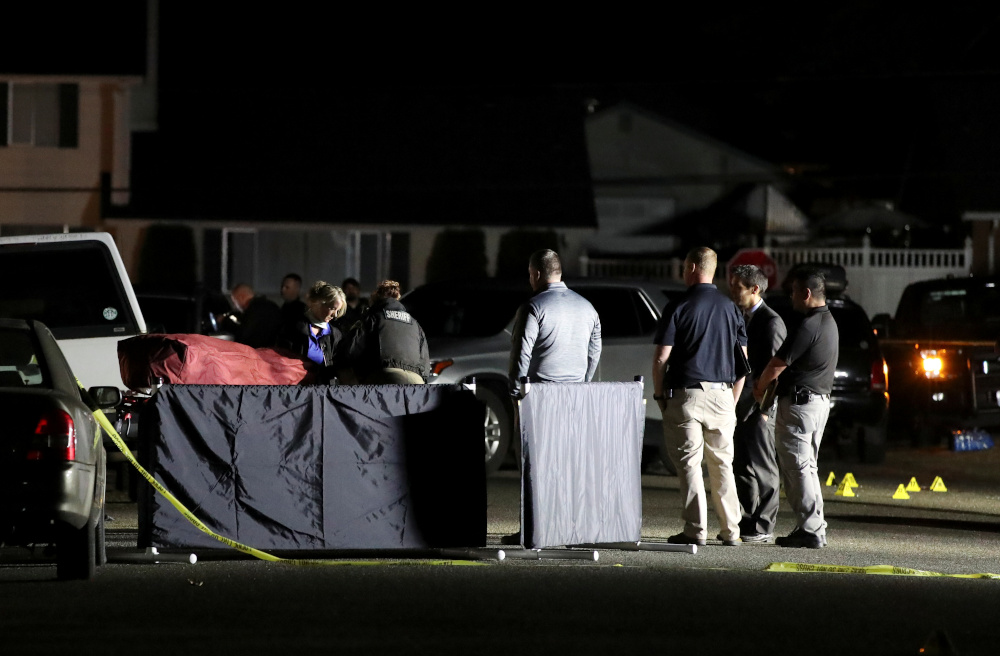 Investigators move the body at Tanglewilde Terrace, where law enforcement officers shot a man reported to be Michael Forest Reinoehl, in Lacey, Washington, US September 4, 2020. u00e2u20acu201d Reuters pic 