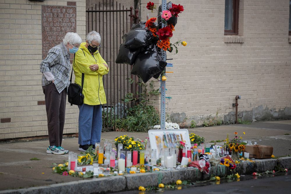Sisters Barbara Dulino and Ann Urquhart, members of the Sisters of St Joseph of Rochester, pray at a memorial for Daniel Prude, a Black man who died after police put a spit hood over his head during an arrest, in Rochester, New York, US. September 5, 2020