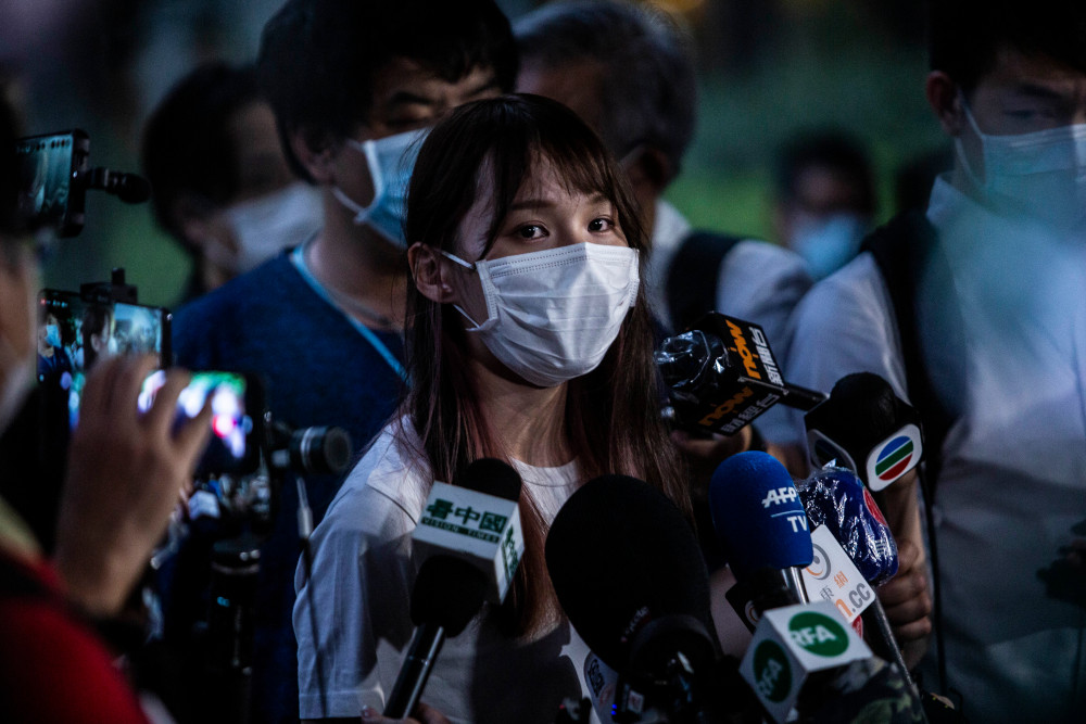 Hong Kong democracy activist Agnes Chow speaks with the media outside Tai Po police station in Hong Kong September 1, 2020, after reporting to police to extend her bail following her recent arrest under Beijingu00e2u20acu2122s new security law. u00e2u20acu201d AFP pic