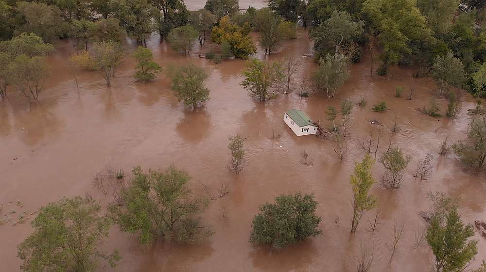 A house floats down the river after flash flooding occurred in the region, in Anduze, France September 19, 2020. u00e2u20acu201d Facebook/ Nature Cevenole/ Photographies de Yannick Lecenes via Reuters