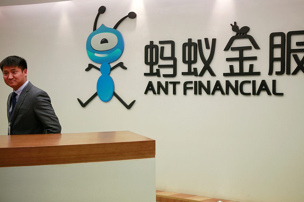 An employee stands next to the logo of Ant Financial Services Group, Alibaba's financial affiliate, at its headquarters in Hangzhou, Zhejiang province, China January 24, 2018. u00e2u20acu201d Reuters pic