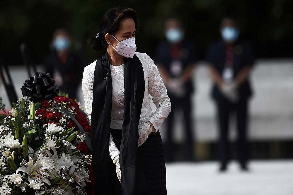 Myanmar State Counsellor and Foreign Minister Aung San Suu Kyi leaves after paying her respects to her late father during a ceremony to mark the 73rd anniversary of Martyrs' Day in Yangon July 19, 2020. u00e2u20acu201d Pool pic via Reuters