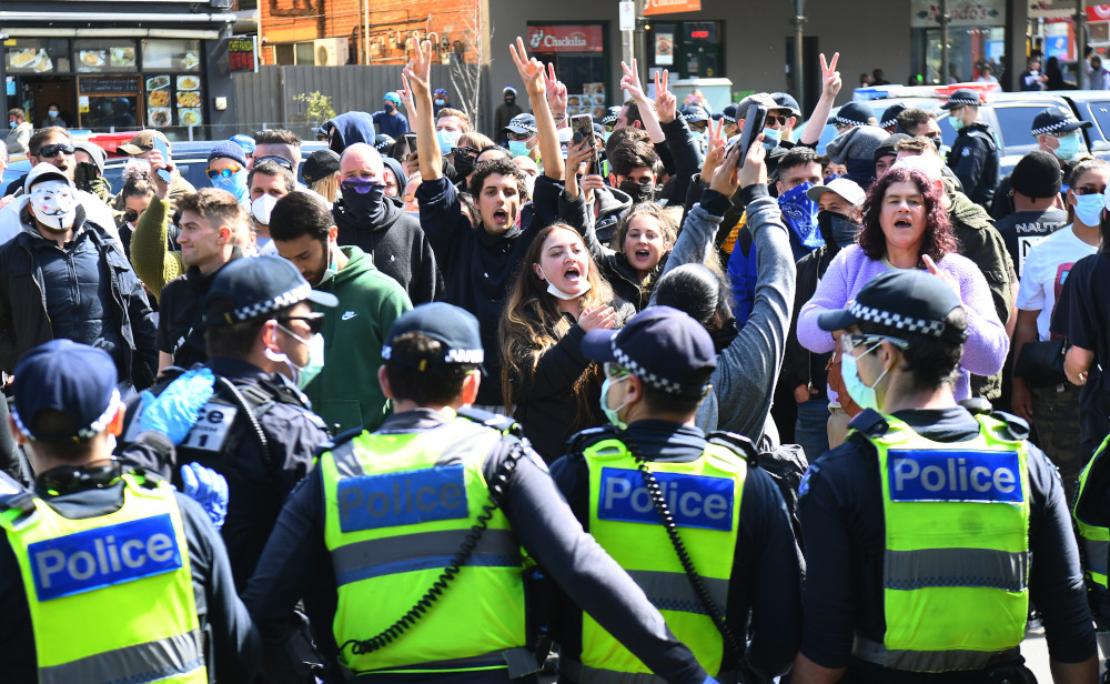 Anti-lockdown protesters chant slogans at Melbourneu00e2u20acu2122s Queen Victoria Market during a rally September 13, 2020, amid the ongoing coronavirus pandemic. u00e2u20acu201d AFP pic 