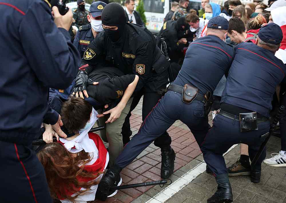Law enforcement officers detain students during a protest against presidential election results in Minsk, Belarus September 1, 2020. u00e2u20acu201d Tut.By pic via Reuters