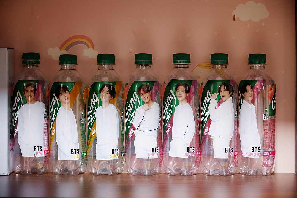Empty soda bottles depicting members of K-pop boy band BTS on display at the room of fan Kim Seo-hyeon in Seoul, South Korea September 23, 2020. u00e2u20acu201d Reuters pic