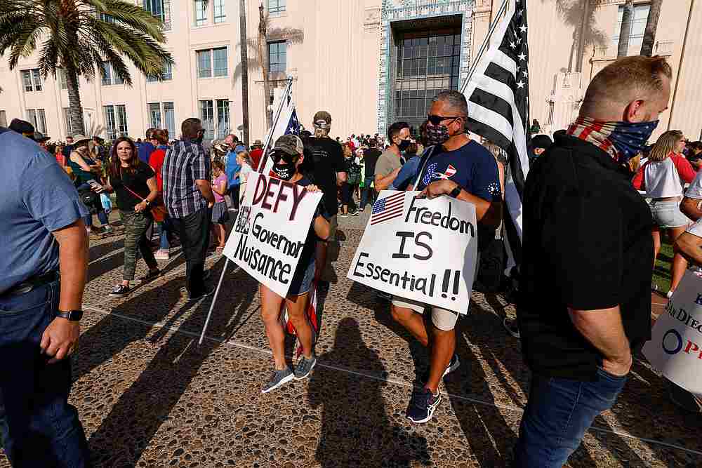 A coalition of business owners rallies for legal action against California governor Gavin Newsom over virus shutdowns in San Diego, California September 21, 2020. u00e2u20acu201d Reuters 