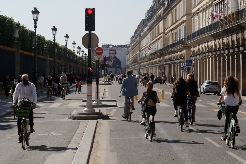 Cyclists riding on the rue de Rivoli in Paris. u00e2u20acu201d AFP pic