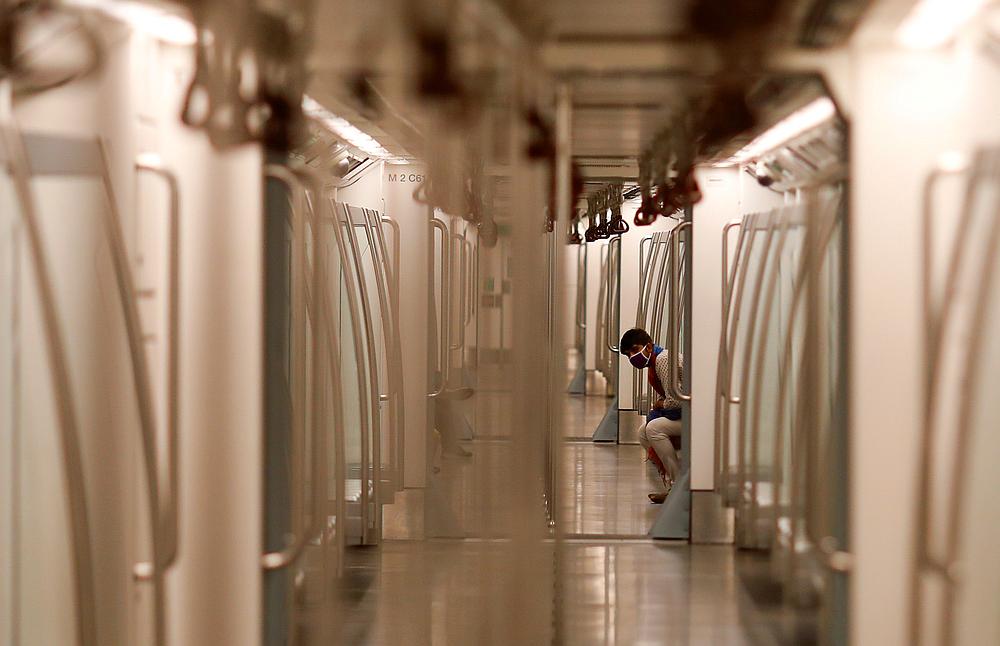 A man wearing a face mask travels inside a Delhi metro train, on the first day of the restart of their operations, amid the Covid-19 spread, in New Delhi, India September 7, 2020. u00e2u20acu201d Reuters pic