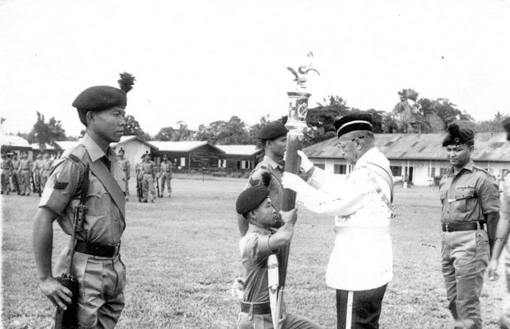 Angking receiving the Battle Truncheon presented by the Head of State, the late Tun Abang Haji Openg Abang Sapiu00e2u20acu2122ee November 19, 1966 in Lundu. u00e2u20acu201d Borneo Post pic