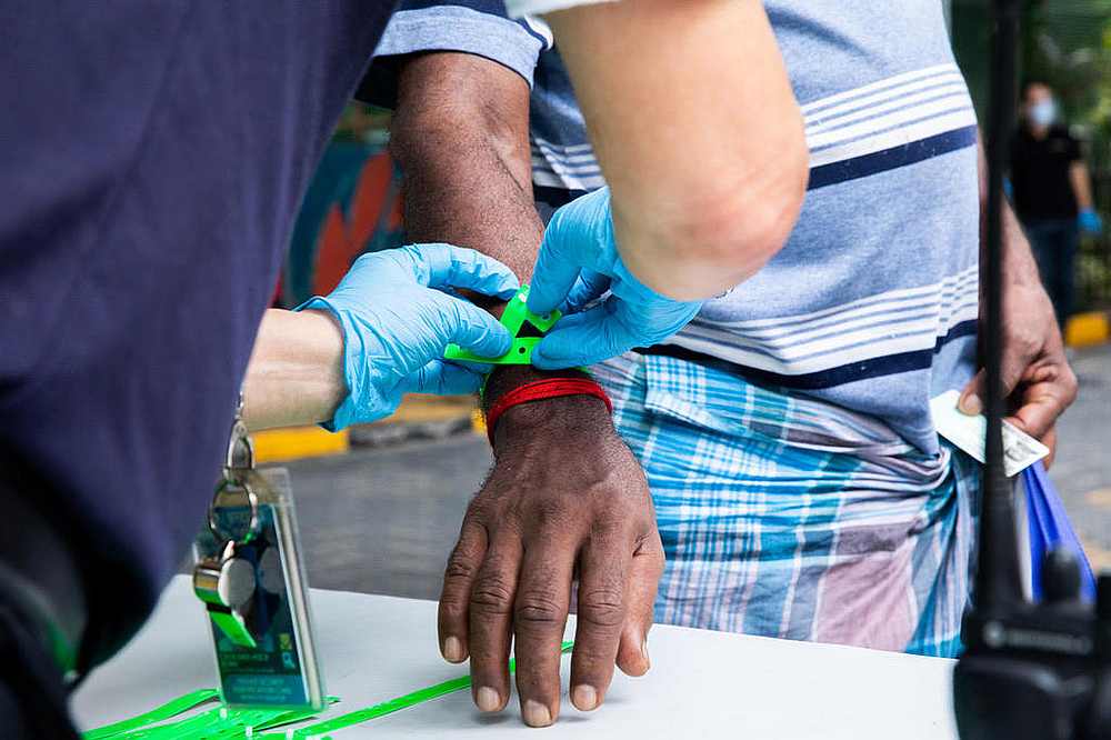 Even though foreign worker dormitories in Singapore were declared cleared of Covid-19 infections in August 2020, the Ministry of Health says there have been about 45 new cases daily. u00e2u20acu201d TODAY pic