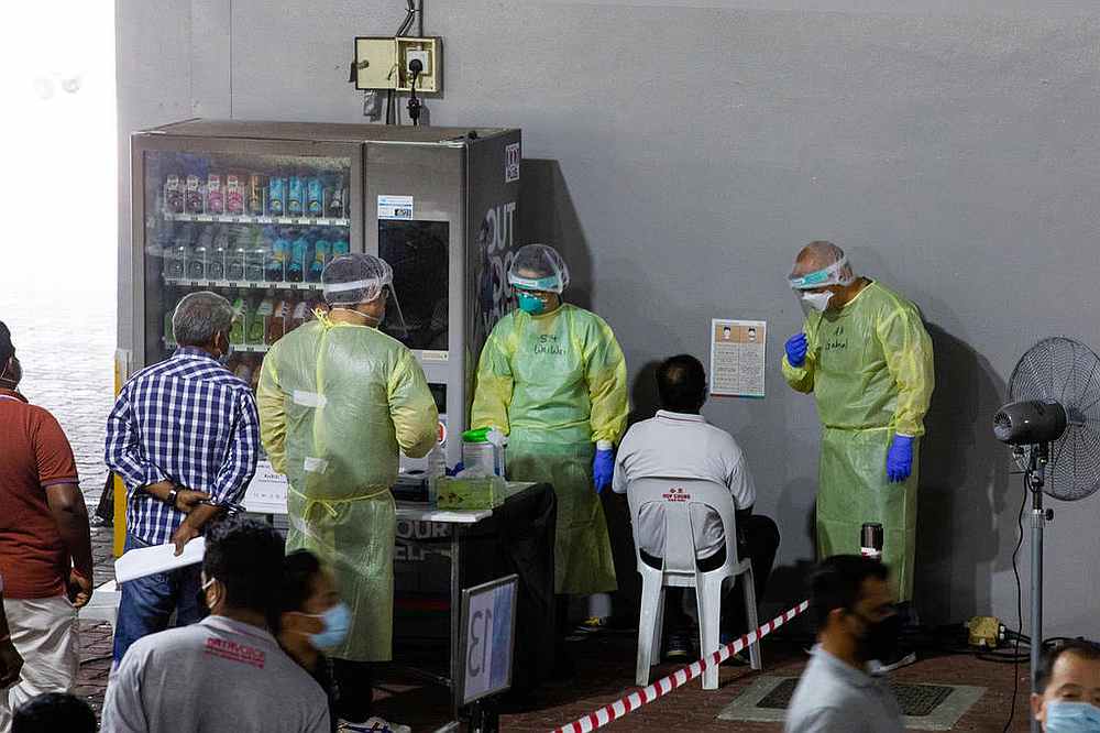 All migrant workers living in dormitories, those employed in the construction, marine and process sectors, as well as those who have to go into work sites have to undergo testing every 14 days. u00e2u20acu201d TODAY pic