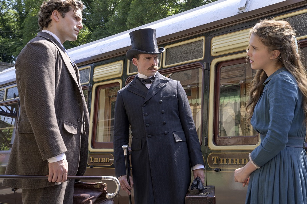 Cavill (left) with actors Sam Claflin and Millie Bobby Brown in a scene from u00e2u20acu02dcEnola Holmesu00e2u20acu2122. u00e2u20acu2022 Picture courtesy of Netflix