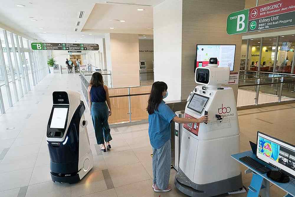 A robot at hospitals under the National University Health System can prevent a visitor from entering if he refuses to comply with the rules. u00e2u20acu201d National University Health System pic via TODAY