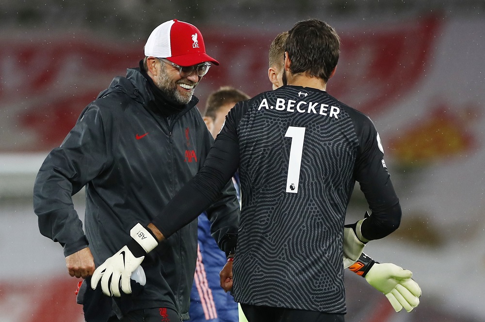 Liverpool manager Juergen Klopp celebrates after the match with Alisson September 29, 2020. u00e2u20acu2022 Reuters pic