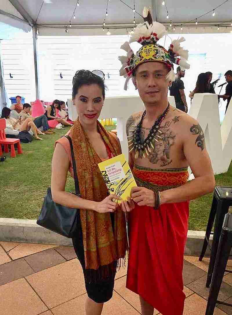 Tell Me, Kenyalang’s literary translator Pauline Fan (left) had in-depth conversations with Kulleh Grasi (right) during the translation process. — Picture courtesy of Pauline Fan