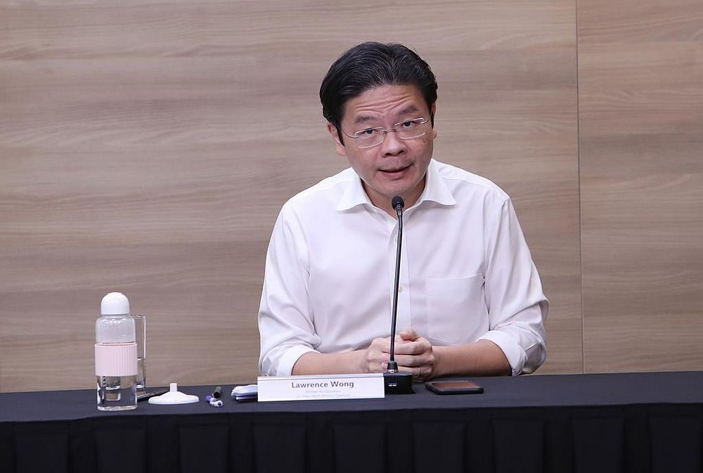 Lawrence Wong says the progressive trajectory towards the third phase of reopening Singapore's economy is contingent on the people doing their part. u00e2u20acu201d Ministry of Communications and Information pic via TODAY