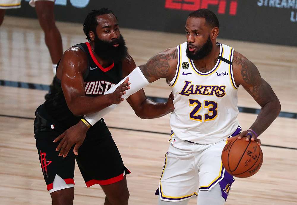 Los Angeles Lakers forward LeBron James (right) dribbles around Houston Rockets guard James Harden in a NBA second round playoff match at Lake Buena Vista, Florida September 12, 2020. u00e2u20acu201d USA TODAY pic via Reuters