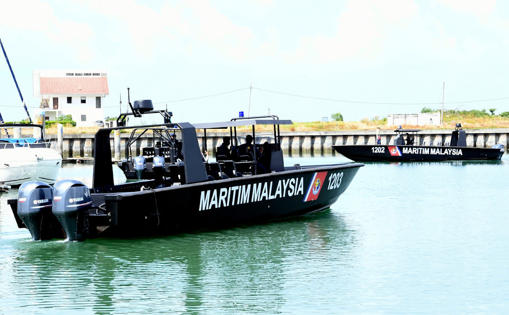 Malaysian Maritime Enforcement Agency officers with u00e2u20acu02dcOp Bentengu00e2u20acu2122 boats in Port Dickson, September 17, 2020. u00e2u20acu201d Bernama pic 