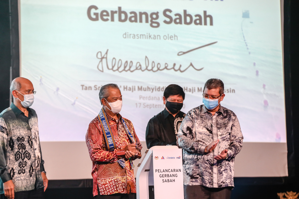 Prime Minister Tan Sri Muhyiddin Yassin during the launch of Sabah Gateway in Kota Kinabalu, Sabah September 17, 2020. With him is Communications and Multimedia Minister Datuk Saifuddin Abdullah. u00e2u20acu201d Picture by Firdaus Latif