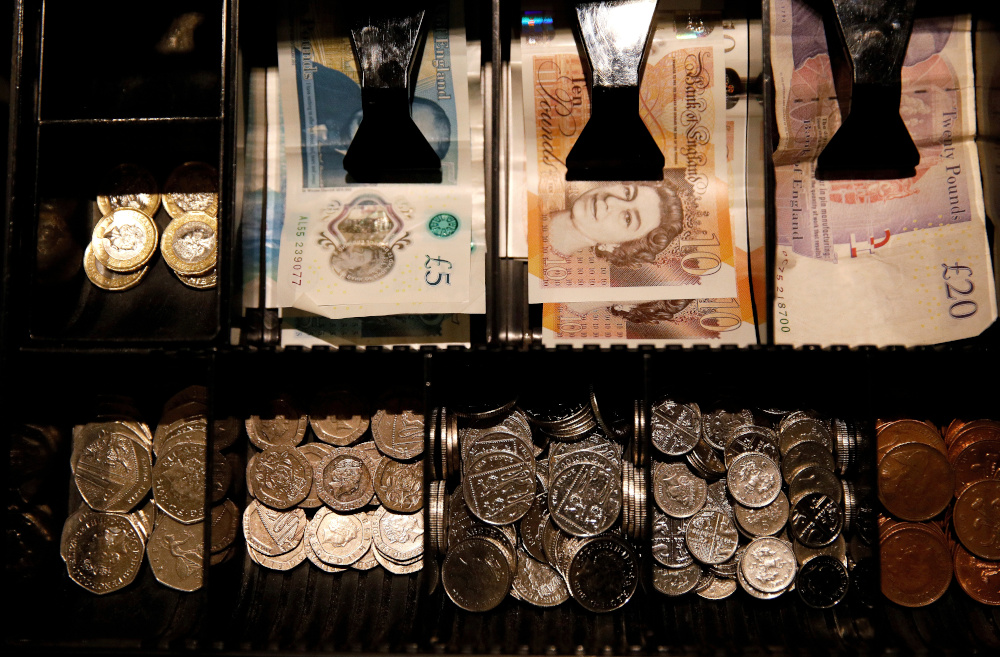 Pound Sterling notes and change are seen inside a cash register in a coffee shop in Manchester, Britain, September 21, 2018. u00e2u20acu201d Reuters pic 