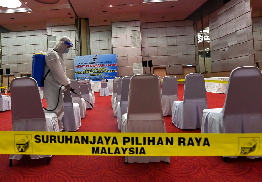 A health personnel sanitises the Kompleks Wisma Wanita nomination centre in Kota Kinabalu September 11, 2020. u00e2u20acu2022 Bernama picn