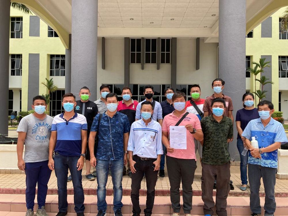 About 30 unlicensed durian farmers were accompanied with four lawyers arrived at the Raub MACC to take turns to give their statements on September 15, 2020. u00e2u20acu201d Picture courtesy of theSave Musang King Alliance 