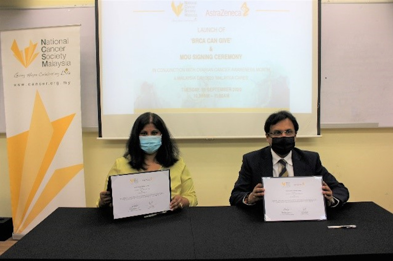 President of NCSM Dr Saunthari Somasundram and Country President of AstraZeneca Malaysia Dr Sanjeev Pancha pose for a picture after the MOU signing September 15, 2020. u00e2u20acu201d Picture courtesy of NCSM/Astrazeneca 