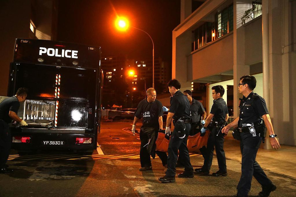 The bodies of the elderly couple were brought down from their Bedok Reservoir flat June 21, 2017. u00e2u20acu201d TODAY pic