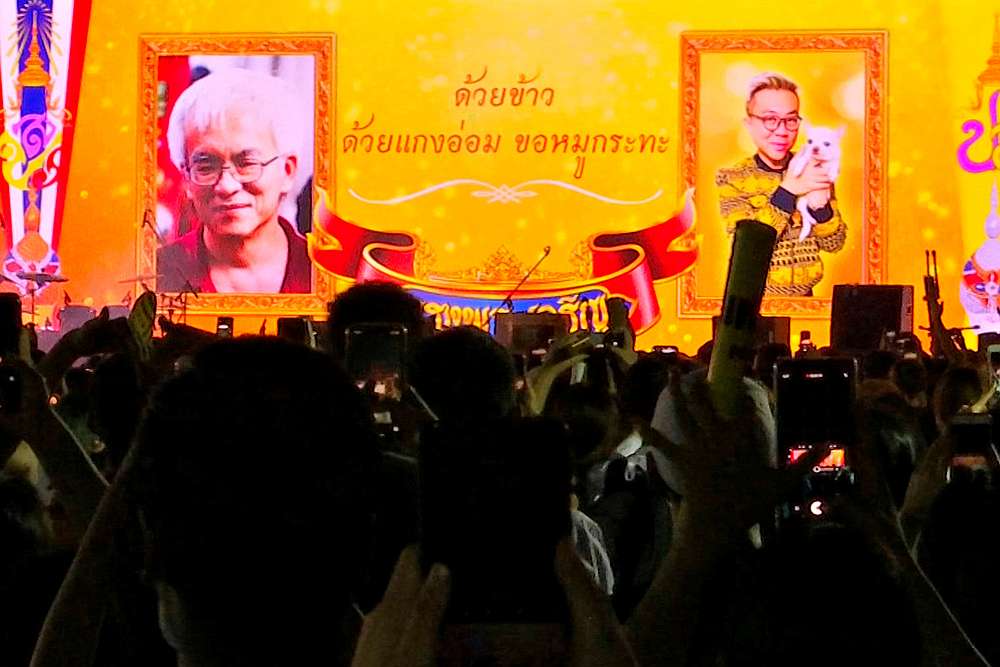 Images of historian Somsak Jeamteerasakul and former diplomat Pavin Chachavalpongpun are projected onto a giant screen at a Thammasat university, Bangkok, Thailand August 10, 2020.  u00e2u20acu201d Reuters pic