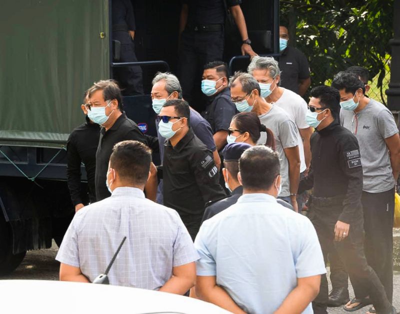 Four factory managers and a worker linked to the recent pollution of Sungai Gong arrive at the Selayang Magistrate's Court September 15, 2020. 