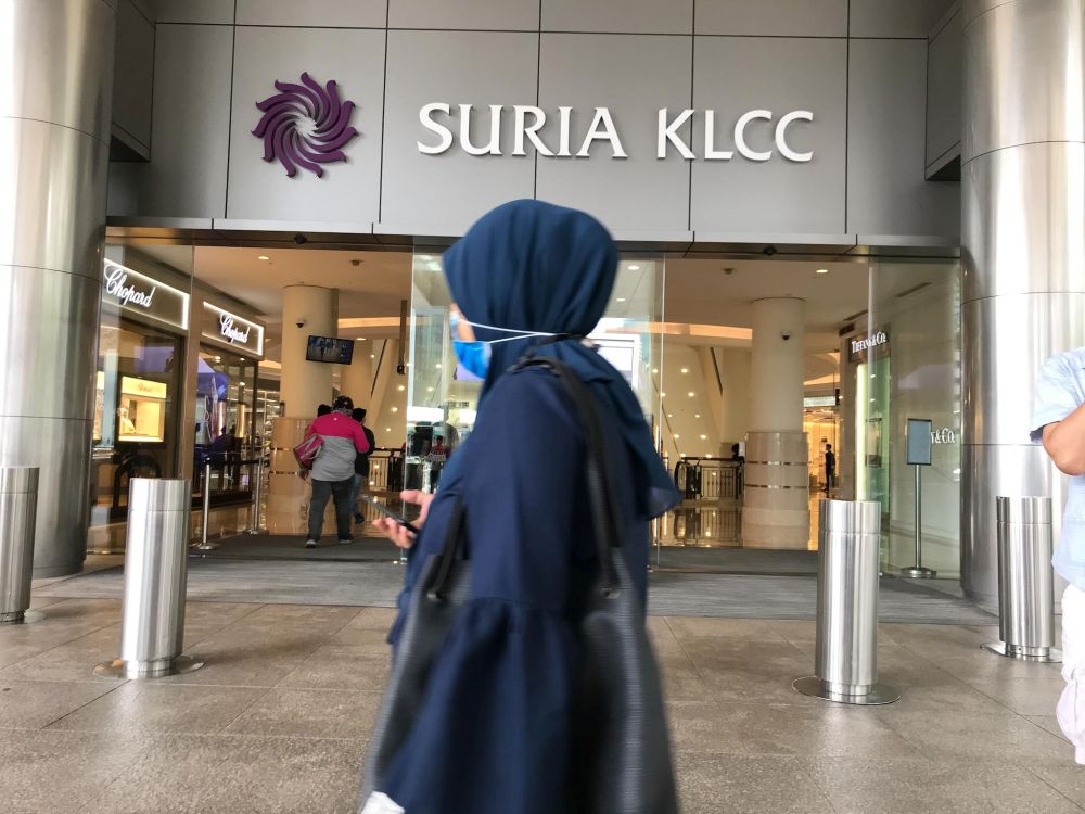Shoppers wearing face masks are seen at Suria KLCC in Kuala Lumpur September 30, 2020. —Picture by Hari Anggara
