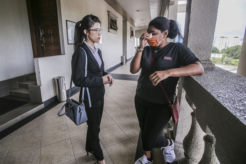 Lawyer Jasmine Wong (left) speaks to Tan Soo Yin (right) at the Kuala Lumpur Court Complex September 24, 2020. u00e2u20acu2022 Picture by Hari Anggara
