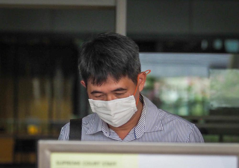 Former Grab driver Tan Yew Sin leaving the Singapore High Court September 29, 2020. u00e2u20acu201d TODAY pic