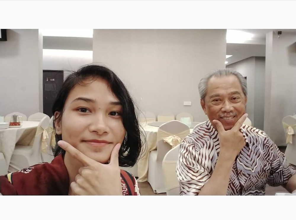 Universiti Malaysia Sabah student Veveonah Mosibin and Prime Minister Tan Sri Muhyiddin Yassin pose for a picture September 12, 2020. u00e2u20acu201d Picture via Instagram/vevemacho