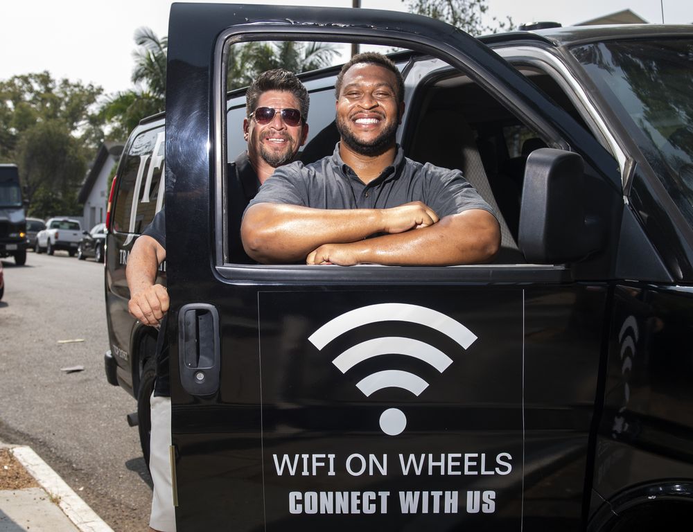 Roman Reyna (left) owner of JFK transportation and Kevin Watson (right), president of JFK transportation. u00e2u20acu201d Valerie Macon pic via AFP