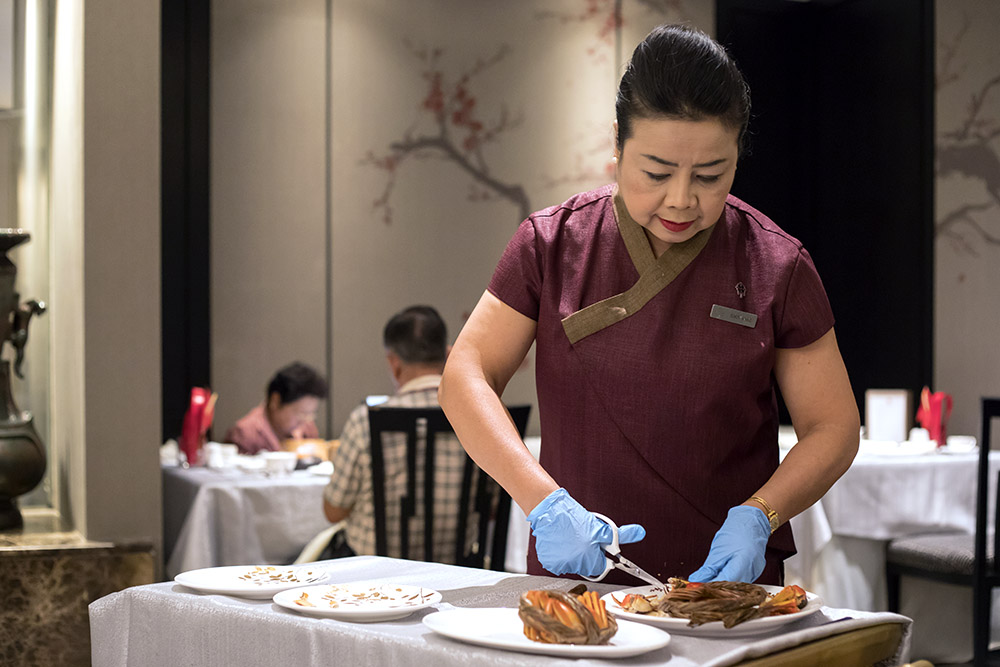 Practice makes perfect: Serving hairy crabs in Bangkok (2019).