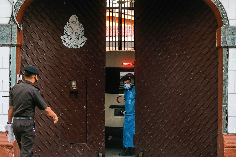 A man in a PPE suit is seen at the Penang Remand Prison along Jalan Penjara, October 6. 2020. u00e2u20acu201d Picture by Sayuti Zainudin