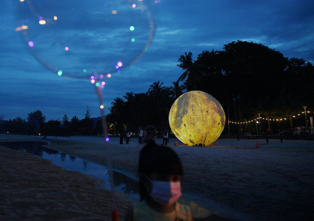 The inflatable giant u00e2u20acu02dcmoonu00e2u20acu2122 on Batu Hitam beach in Kuantan October 18, 2020. u00e2u20acu201d Bernama pic