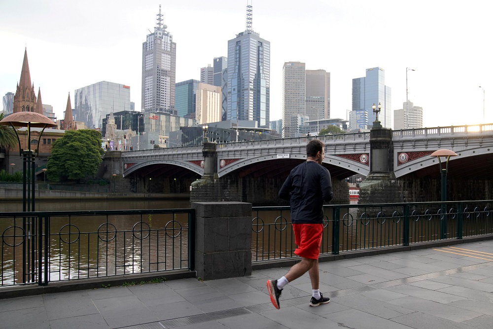 A man runs along a waterway after lockdown restrictions were implemented in response to an outbreak of the coronavirus disease in Melbourne July 10, 2020. u00e2u20acu201d Reuters pic