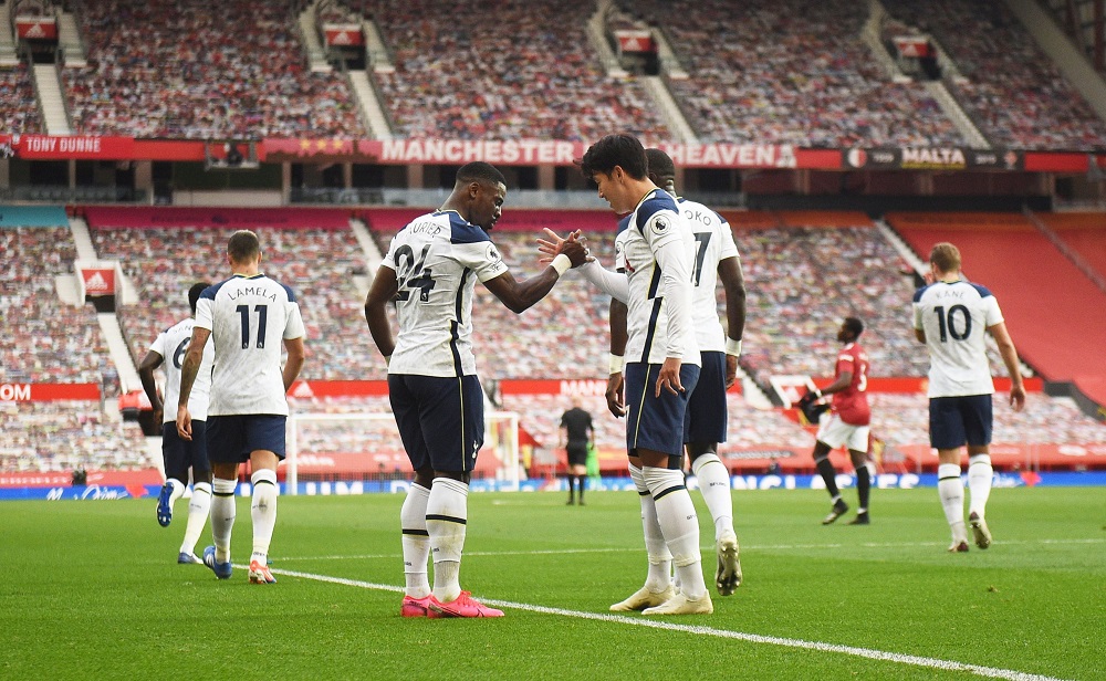 Tottenham Hotspuru00e2u20acu2122s Son Heung-min celebrates scoring their fourth goal with Serge Aurier at the Old Trafford in Manchester October 4, 2020. u00e2u20acu201d Picture by Pool via Reuters