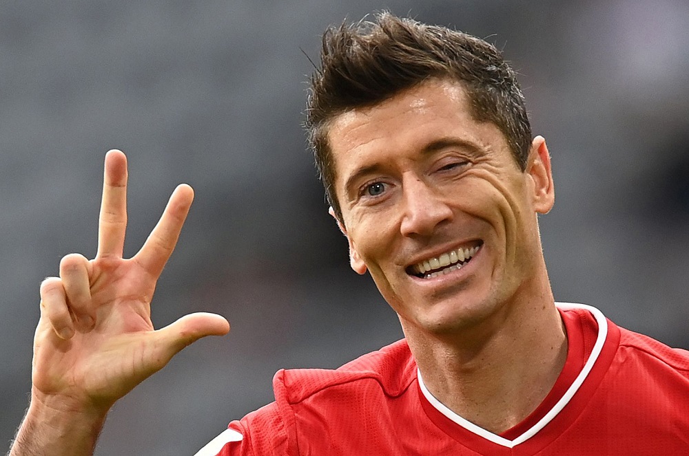 Bayern Munich's Robert Lewandowski celebrates scoring their third goal to complete his hat-trick against Eintracht Frankfurt at the Allianz Arena in Munich October 24, 2020. u00e2u20acu201d Pool pic via Reuters