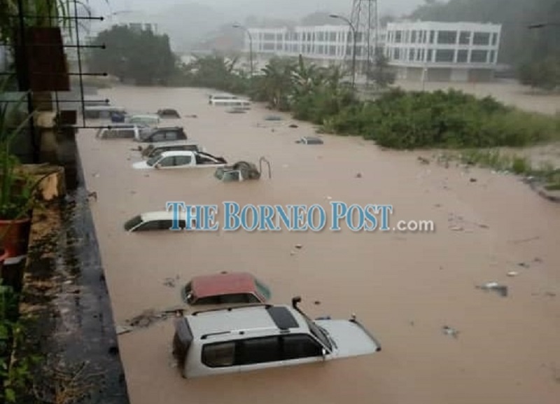 Giling at Jalan Telipok-Tuaran is inundated by floodwater. u00e2u20acu201d Borneo Post Online pic