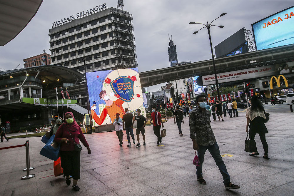 A billboard displaying Covid-19 SOP issued by the government is seen in Kuala Lumpur October 11, 2020. u00e2u20acu201d Picture by Hari Anggara