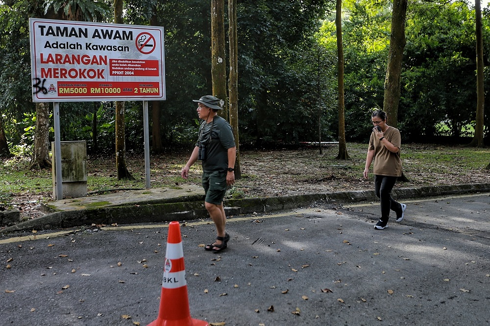 People jog at Taman Rimba Kiara in Kuala Lumpur during the CMCO period October 19, 2020. u00e2u20acu201d Picture by Ahmad Zamzahuri