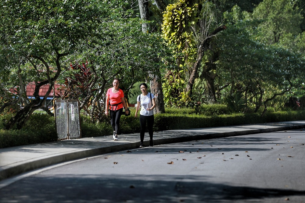 People jog at Taman Botani Perdana in Kuala Lumpur during the CMCO period October 19, 2020.